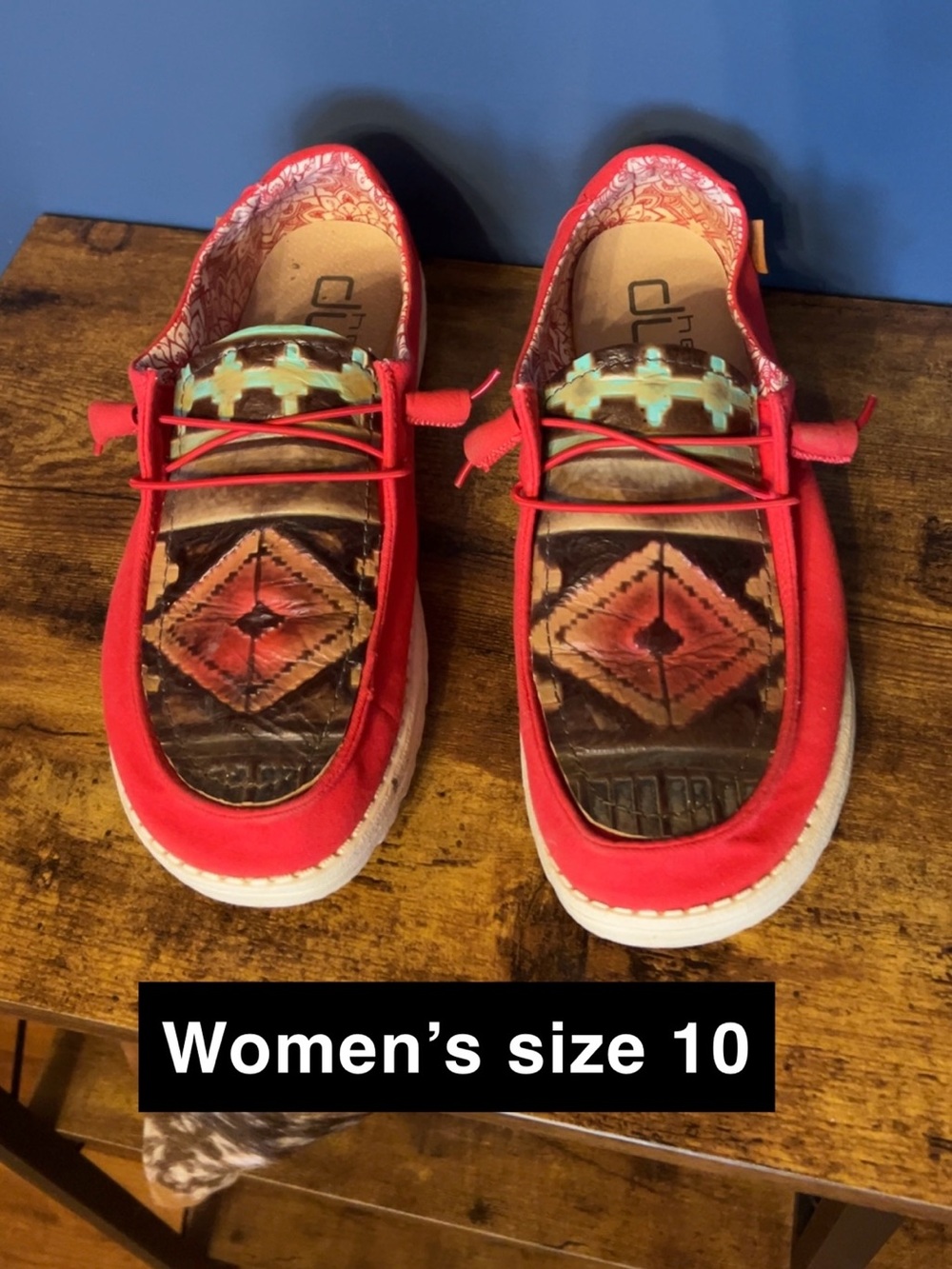 Hey Dude Women's Red Slip-Ons with Southwestern leather patch